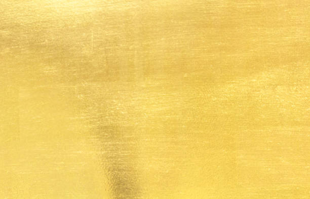 istock Shiny yellow leaf gold foil texture background 882115912