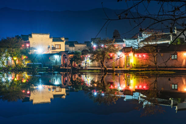 istock Chinese ancient villages at night 882129062