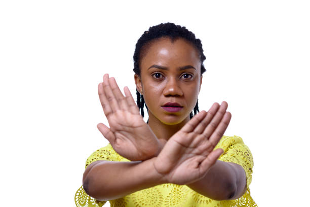 istock African American woman showing two hands stop gesture 882132492