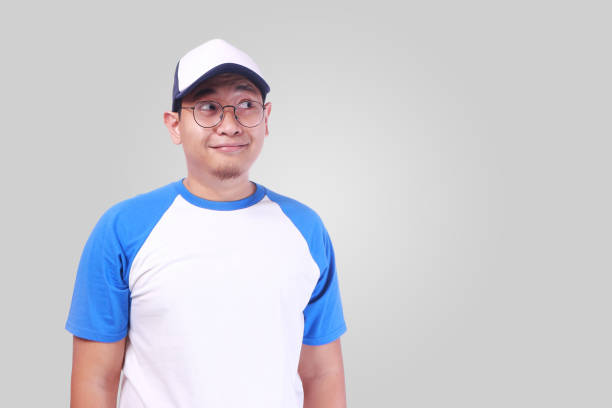 istock Young Asian Man Smiling Happily 882138252