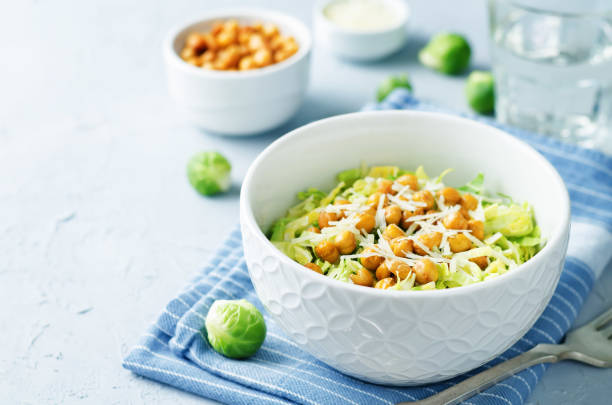 istock Shreded Brussels sprouts roasted chickpeas Parmesan salad 882138372