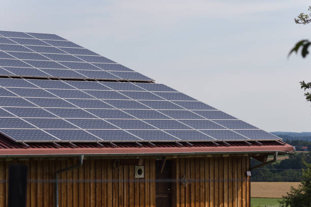 solar panel on a roof of a rural building in south germany countryside on a hot summer day in july