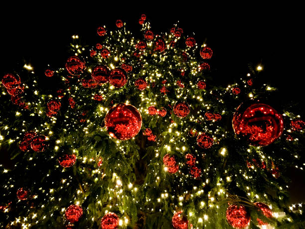istock christmas tree red balls decorations at street market 882140580