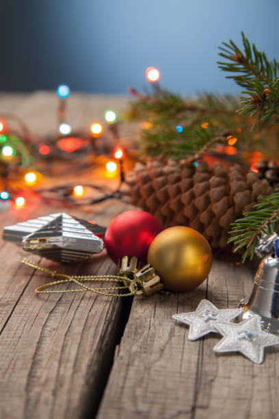 istock Christmas ornaments on a table in the snow with nice festive background Xmas illuminations 882140656