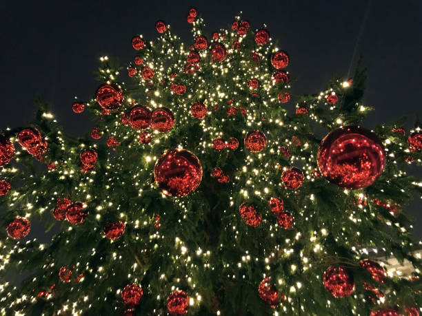 istock christmas tree red balls decorations at street market 882140666