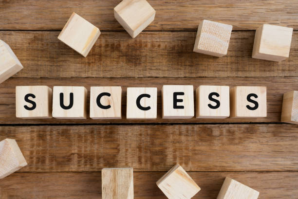 istock Success Word on Wooden Block 882140742