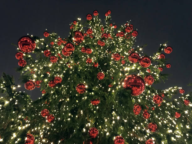 istock christmas tree red balls decorations at street market 882140996