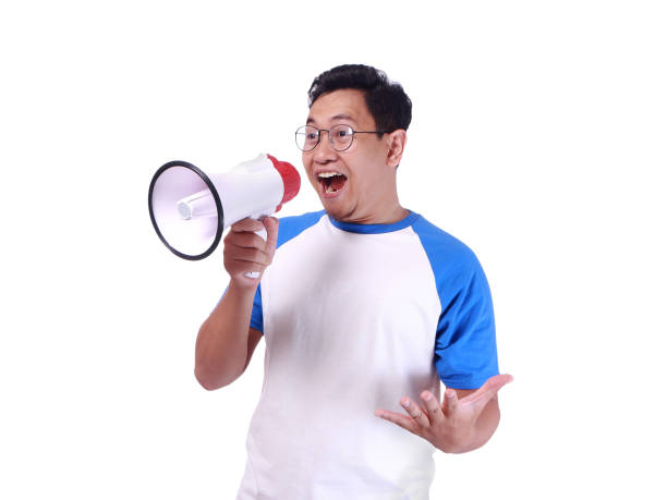 istock Young Man Shouting with Megaphone, Promotion Concept 882141008