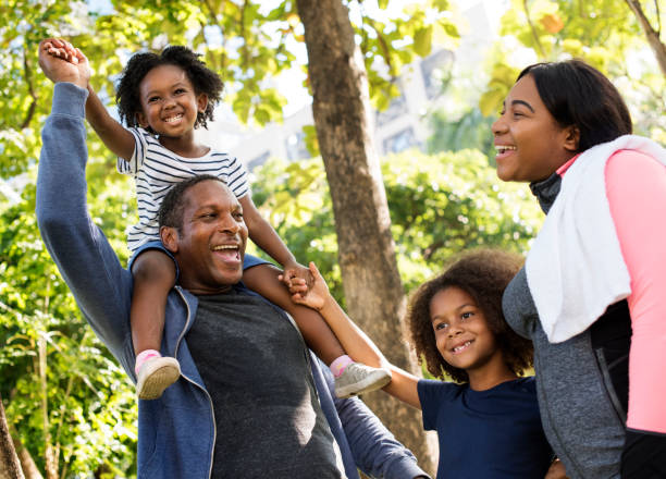istock African family bonding in the park 882144364