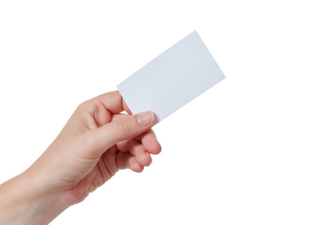 istock Left hand holds out business card against white 882168540