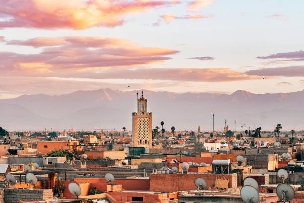 istock panoramic views of marrakech medina with atlas mountain range at background, morocco 882169252