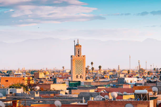 istock panoramic views of marrakech medina with atlas mountain range at background, morocco 882169340