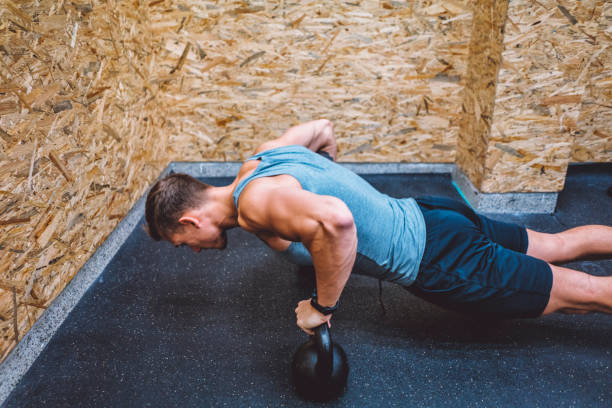 istock Push-ups with kettlebells are my favourite 882186656