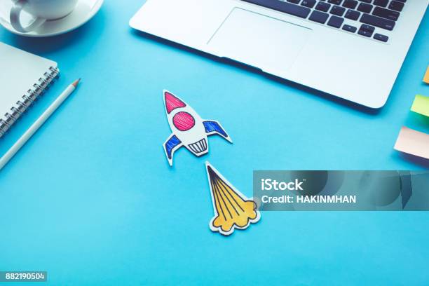 Business Start Up Concept With Rocket On Desk Tablecreativity Innovation Stock Photo - Download Image Now