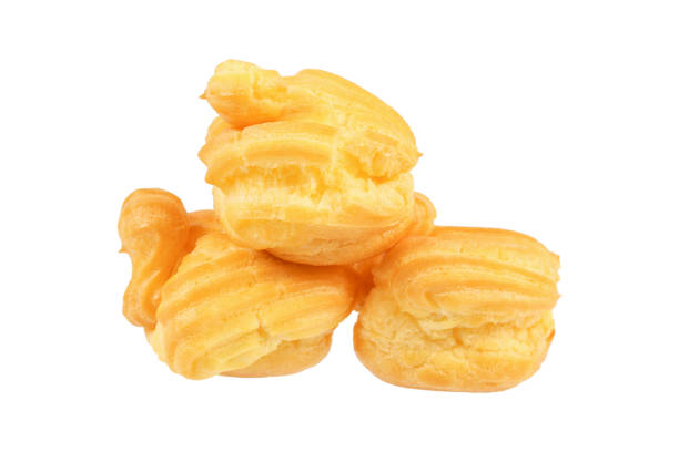 istock pile of eclair or profiterole isolated on white 882201034