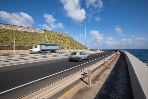 istock blurred cars on the road 882208320