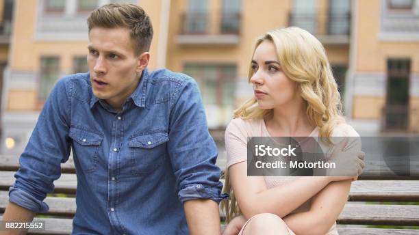 Jealous Girl Having Fight With Upset Boyfriend Conflict Of Unhappy People Stock Photo - Download Image Now