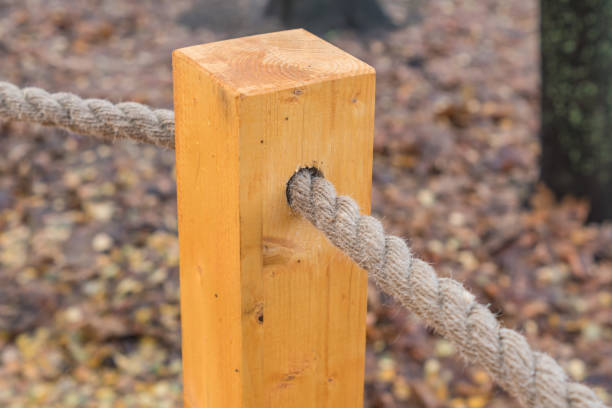 istock wooden pole with a rope 882216320
