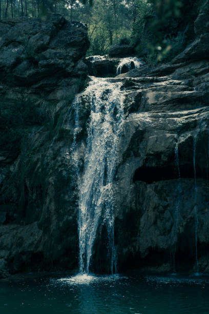 istock Pure mountain creek with green water 882220988