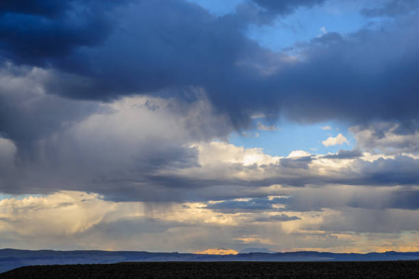 Storm clouds over mono lake Threatening storm clouds are hanging low over mono lake, near the town of Lee Vining, in the Sierra Nevada mountain range. Sierra Nevadas, Eastern California, USA. lake monona photos stock pictures, royalty-free photos & images