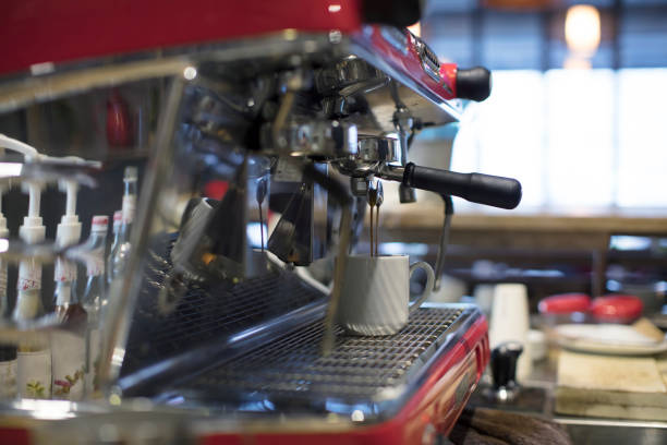 istock Filling a Mug of Coffee at Coffee Machine 882232226
