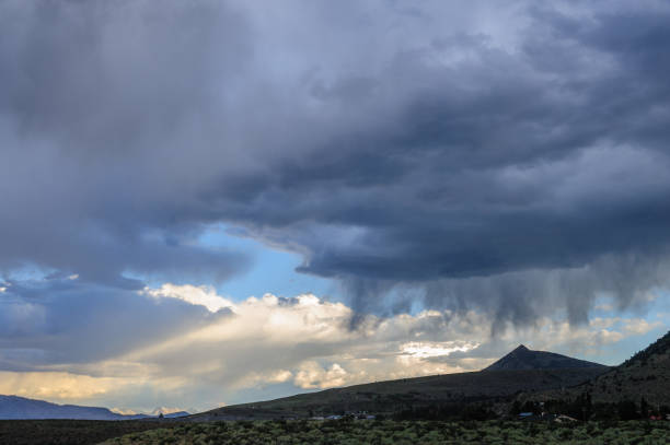 Storm clouds over mono lake Threatening storm clouds are hanging low over mono lake, near the town of Lee Vining, in the Sierra Nevada mountain range. Sierra Nevadas, Eastern California, USA. lake monona photos stock pictures, royalty-free photos & images