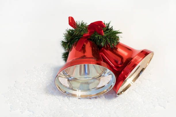 istock Christmas bells with a red bow 882232290