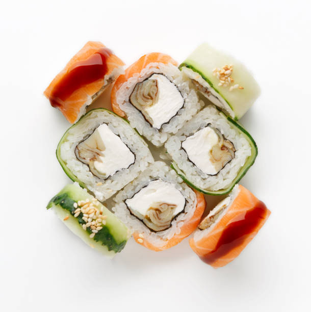 istock Set of fish rolls isolated on white, closeup 882236736