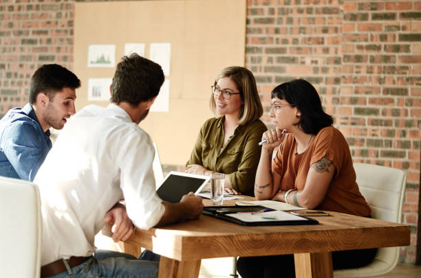 istock Busy putting their ideas together 882240120