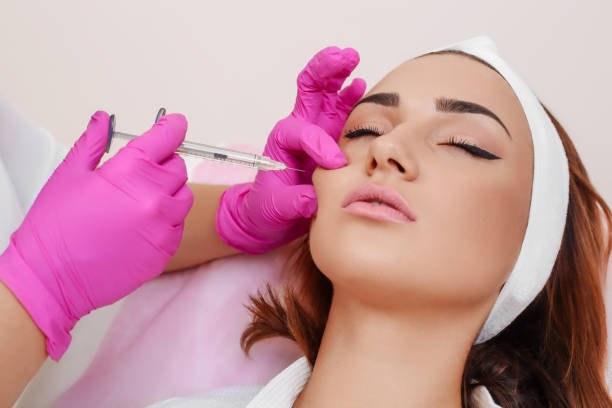 istock Mesotherapy injections in the face. 882243672