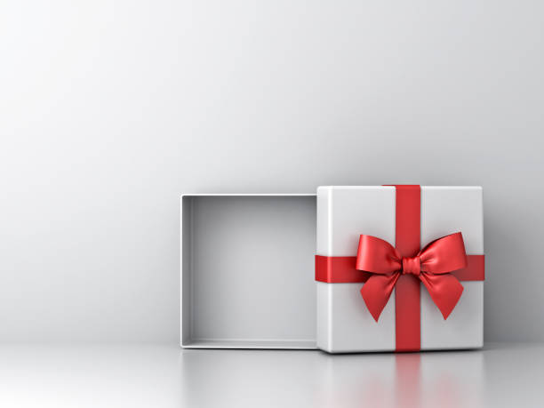 istock Open gift box or present box with red ribbon bow and empty space in the box on white wall background with shadow and reflection 882246110