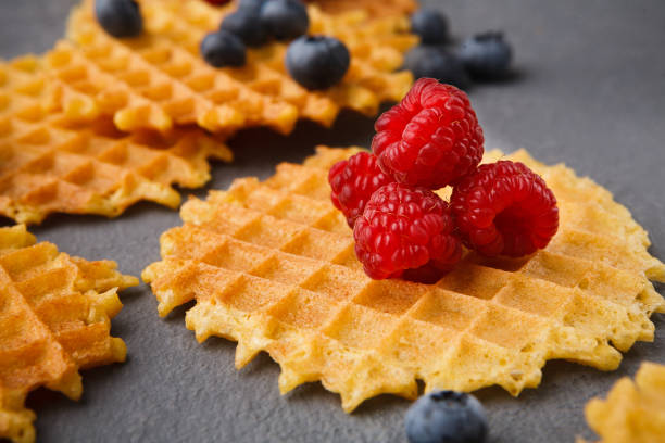 istock Round belgium waffles with berries 882258276