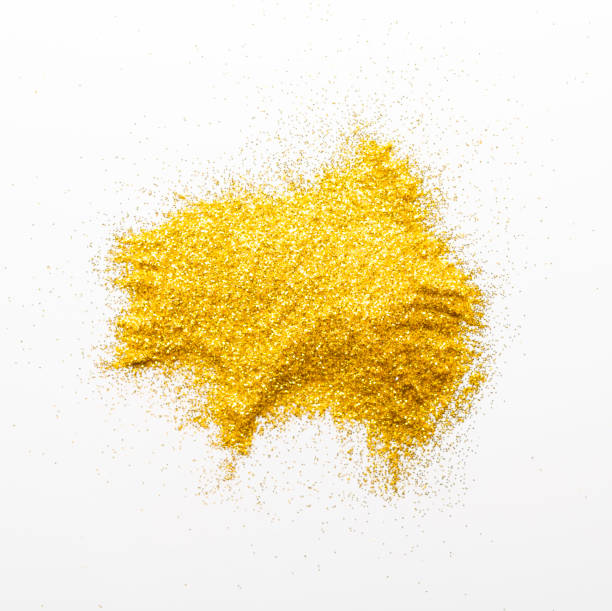 istock Golden glitter sand texture on white background 882262272
