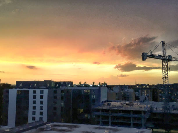 istock sunset on the roof and construction 882267848