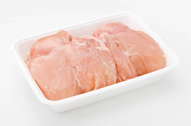 istock Chicken breast raw meat in a styrofoam tray 882277920