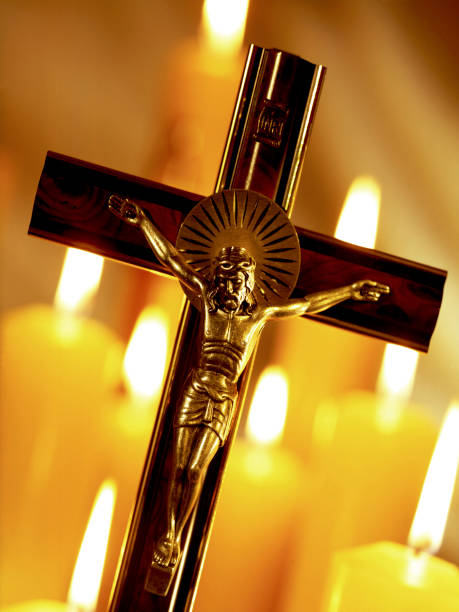 istock Crucifix and Church Candles 882280434