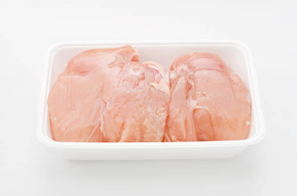 istock Chicken breast raw meat in a styrofoam tray 882280610