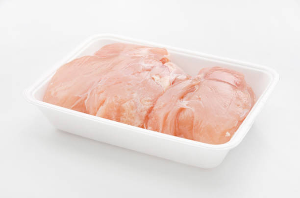 istock Chicken breast raw meat in a styrofoam tray 882280922