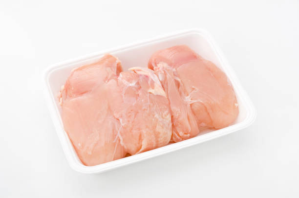 istock Chicken breast raw meat in a styrofoam tray 882281102