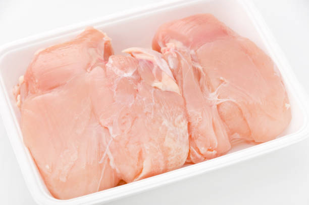 istock Chicken breast raw meat in a styrofoam tray 882281288