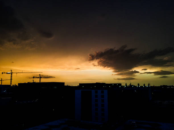 istock sunset on the roof and construction 882282406
