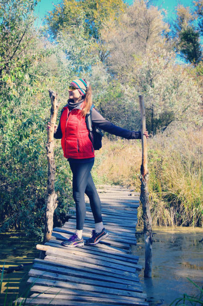 istock girl on a wooden bridge 882288798