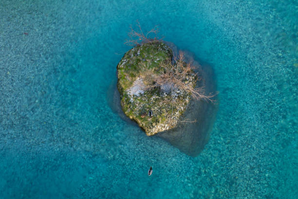 istock upper view on rocks in turquoise crystal clear river, italy 882291294