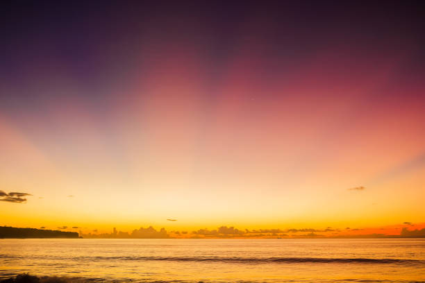 istock Ocean at colorful bright sunset with clouds 882296124