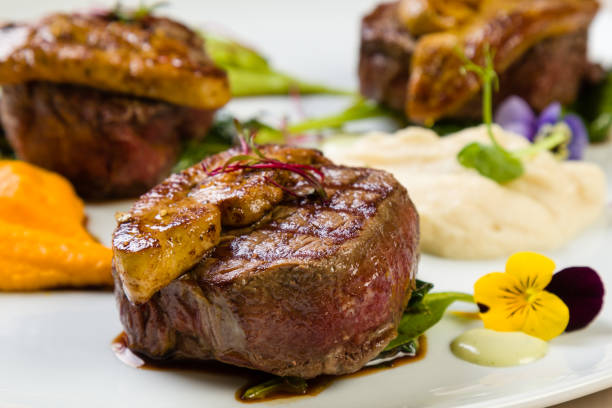 beef filets with foie gras stock photo