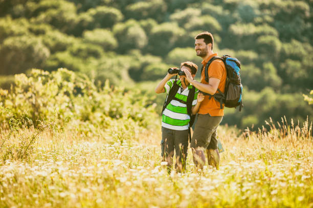 istock Father and son in nature 882303230