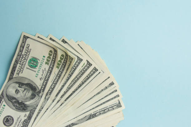 деньги американский доллар фон - one hundred dollar bill dollar stack paper currency стоковые фото и изображения