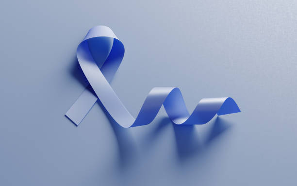 Blue Prostate Cancer Awareness Ribbon On Blue Background Blue prostate cancer awareness ribbon on blue background. Horizontal composition with copy space. light blue silk stock pictures, royalty-free photos & images