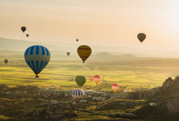 istock Hot air balloons flying over Cappadocia, Turkey 882314772