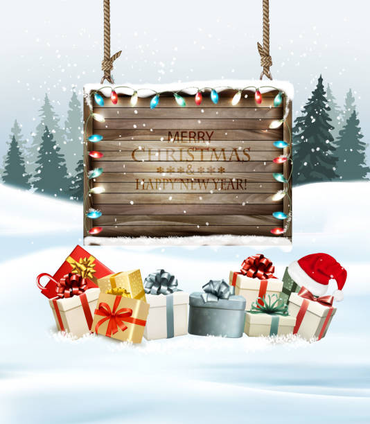 istock Christmas holiday background with colorful gift boxes and wooden sign. 882314884